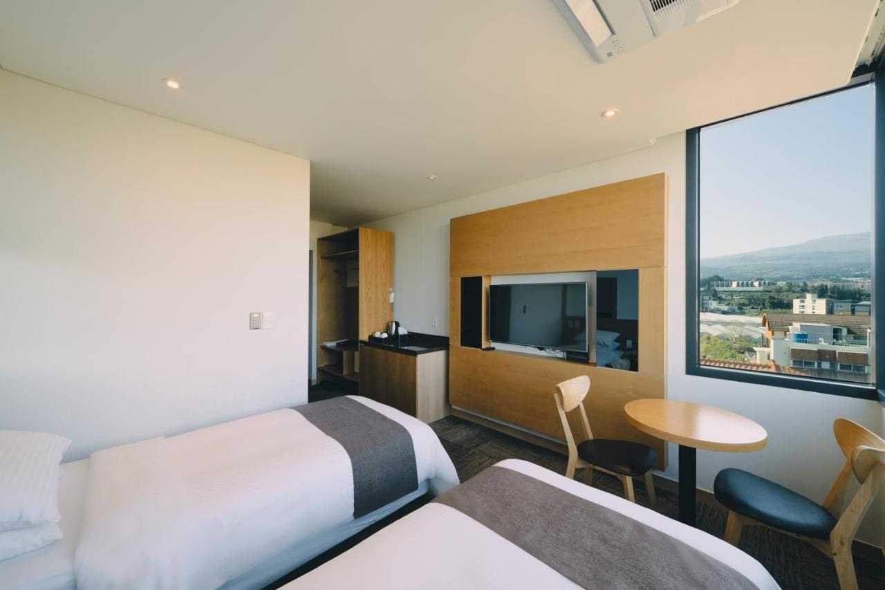 Jeju Poong Gyung Hotel مدينة سيوجويبو المظهر الخارجي الصورة