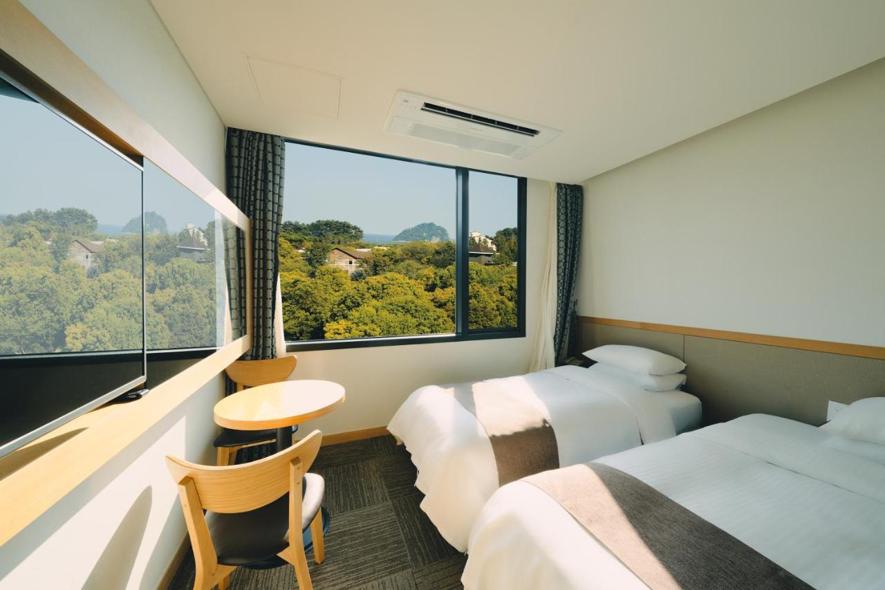 Jeju Poong Gyung Hotel مدينة سيوجويبو المظهر الخارجي الصورة